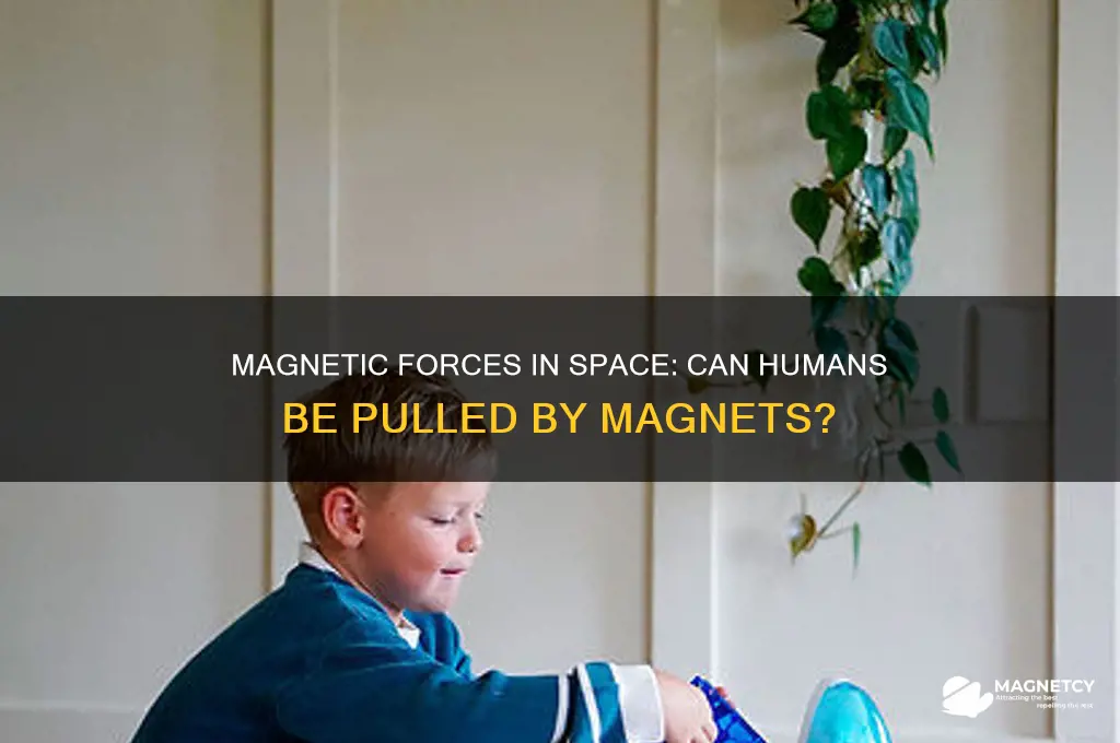 can humans be pulled by magnet in space