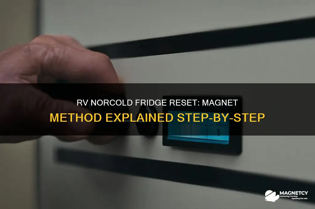 how to use magnet on rv norcold refrigerator to reset